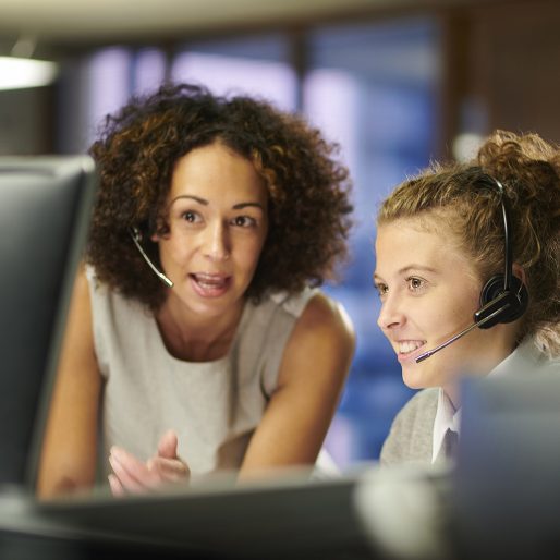 a female call centre worker trains an intern