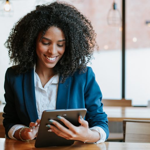 Young businesswoman using digital tablet